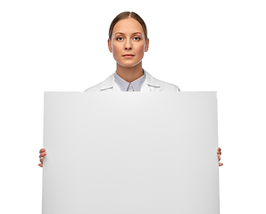 Image showing female doctor or scientist holding white board