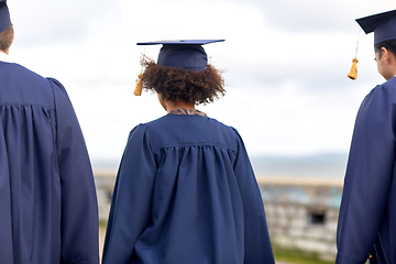 Image showing graduate students or bachelors in mortar boards