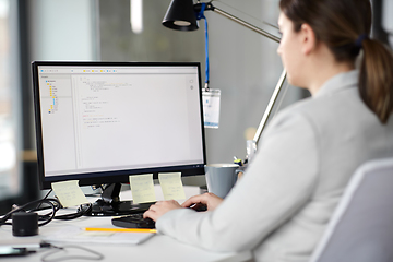 Image showing businesswoman with computer working at office