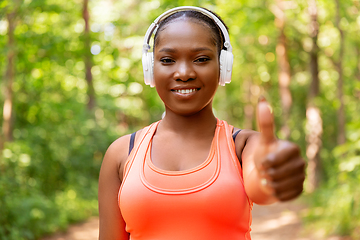 Image showing happy african american woman with headphones