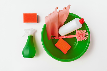 Image showing basin with cleaning tools on white background