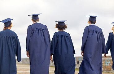 Image showing graduate students or bachelors in mortar boards