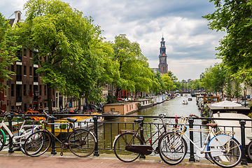 Image showing Bicycles on a bridge over the canals of Amsterdam