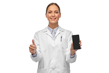 Image showing female doctor with smartphone showing thumbs up