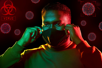 Image showing african american man wearing black reusable mask