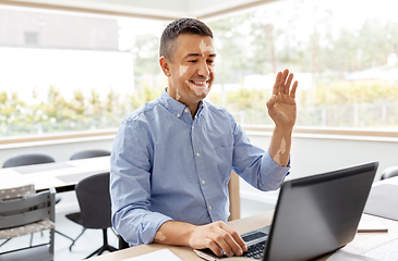 Image showing man with vitiligo laptop having video call at home