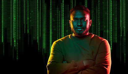 Image showing young african american man over binary code