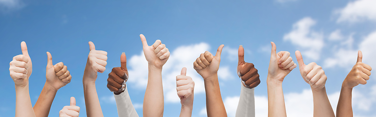 Image showing people with diverse ethnicity showing thumbs up