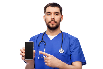 Image showing doctor or male nurse with smartphone