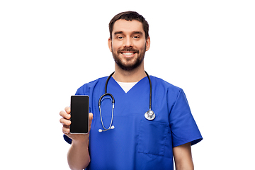 Image showing smiling doctor or male nurse with smartphone