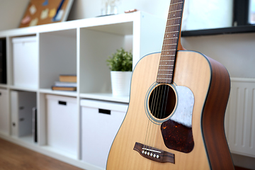 Image showing close up of acoustic guitar at home