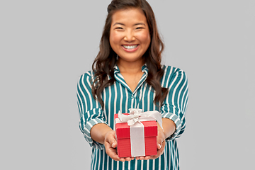 Image showing happy asian woman with birthday present