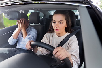 Image showing car driving school instructor teaching woman