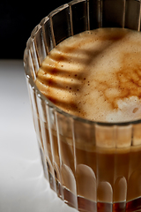 Image showing close up of coffee in glass on table