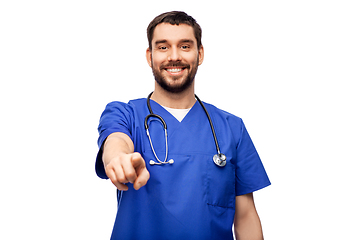 Image showing smiling doctor or male nurse pointing to camera