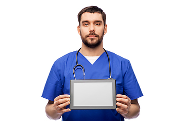 Image showing doctor or male nurse showing tablet computer