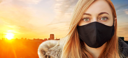 Image showing woman wearing protective reusable barrier mask