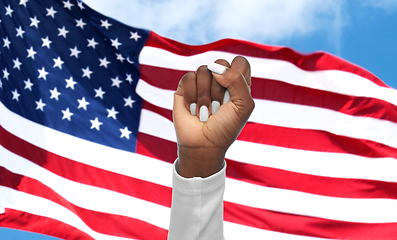 Image showing hand of african woman over american flag