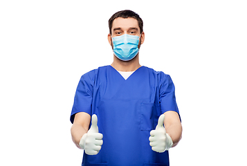 Image showing male doctor in mask showing thumbs up