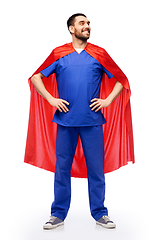 Image showing smiling doctor or male nurse in superhero cape