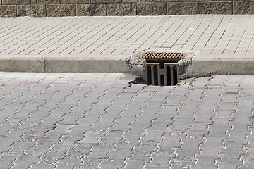 Image showing metal sewer grating