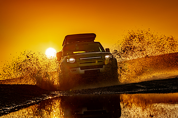 Image showing Off road tourist car rides off-road in the highlands. Expedition