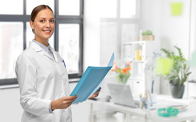 Image showing female doctor with folder at hospital