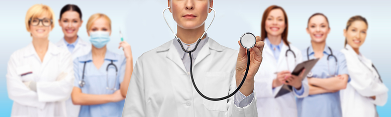 Image showing close up of female doctor with stethoscope