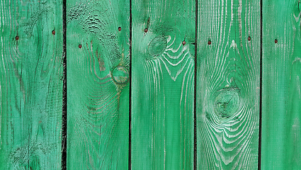 Image showing Texture of weathered wooden green painted fence