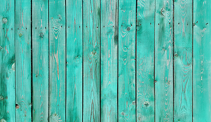 Image showing Texture of weathered wooden green painted fence