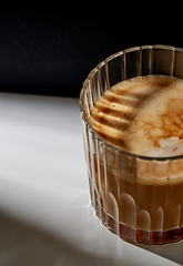 Image showing close up of coffee in glass on table