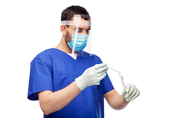 Image showing male doctor in mask with cotton swab and test tube