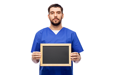 Image showing male doctor or nurse with chalkboard