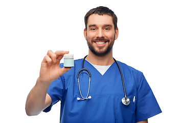 Image showing doctor or male nurse with medicine and stethoscope