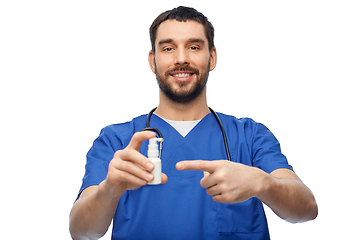 Image showing doctor or male nurse with medicine and stethoscope