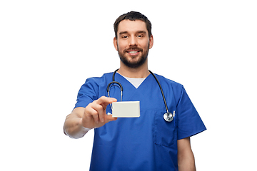 Image showing doctor or male nurse with medicine and stethoscope
