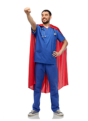 Image showing smiling doctor or male nurse in superhero cape