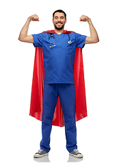 Image showing smiling doctor or male nurse in superhero cape