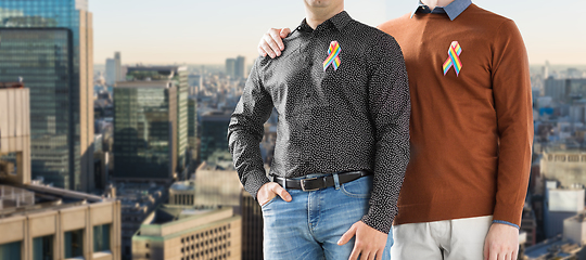 Image showing close up of couple with gay pride ribbons in tokyo