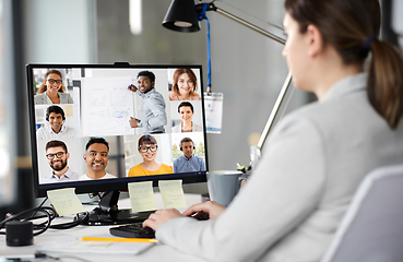Image showing businesswoman having video conference on computer