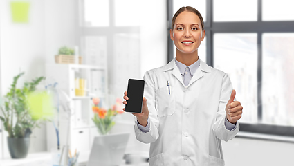 Image showing female doctor with smartphone showing thumbs up