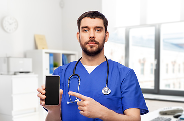 Image showing doctor or male nurse with smartphone