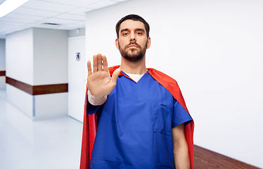 Image showing doctor or male nurse in superhero cape at hospital