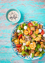 Image showing Healthy Grilled Chicken Caesar Salad with Cheese and Croutons