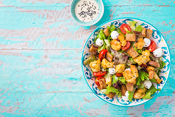 Image showing Healthy Grilled Chicken Caesar Salad with Cheese and Croutons