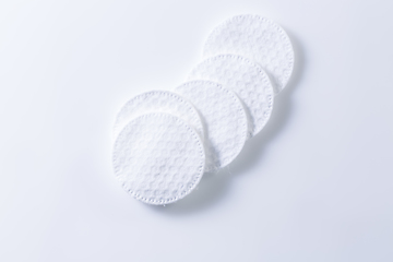 Image showing Cotton pads with a shadow on white. Copy space for your text