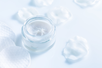 Image showing Moisturizing cosmetic cream with cotton pads