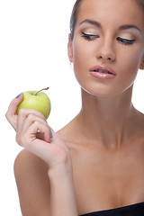 Image showing model with apple