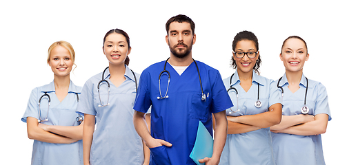 Image showing doctor or male nurse with group of medical workers