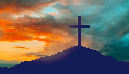 Image showing silhouette of cross on calvary hill over sky